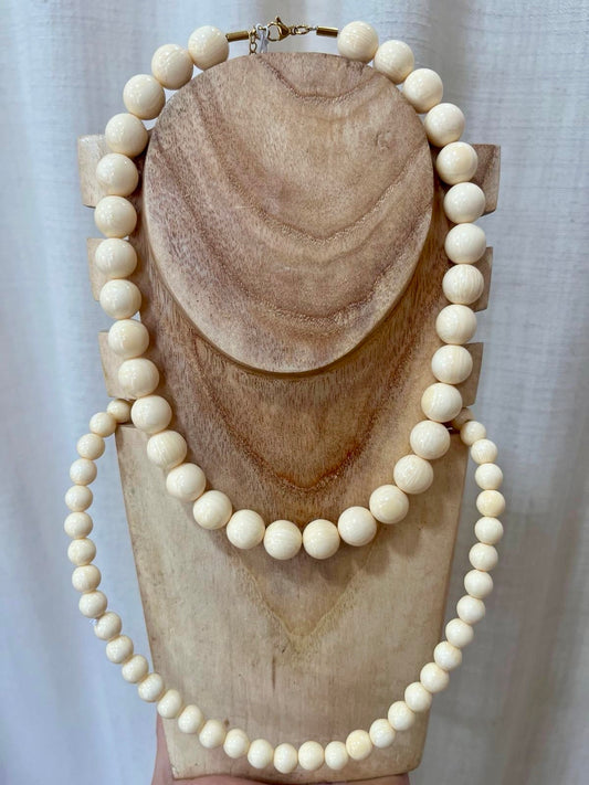 Collar hueso beige