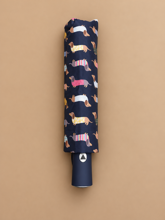 Paraguas plegable con estampado de teckel y funda a juego